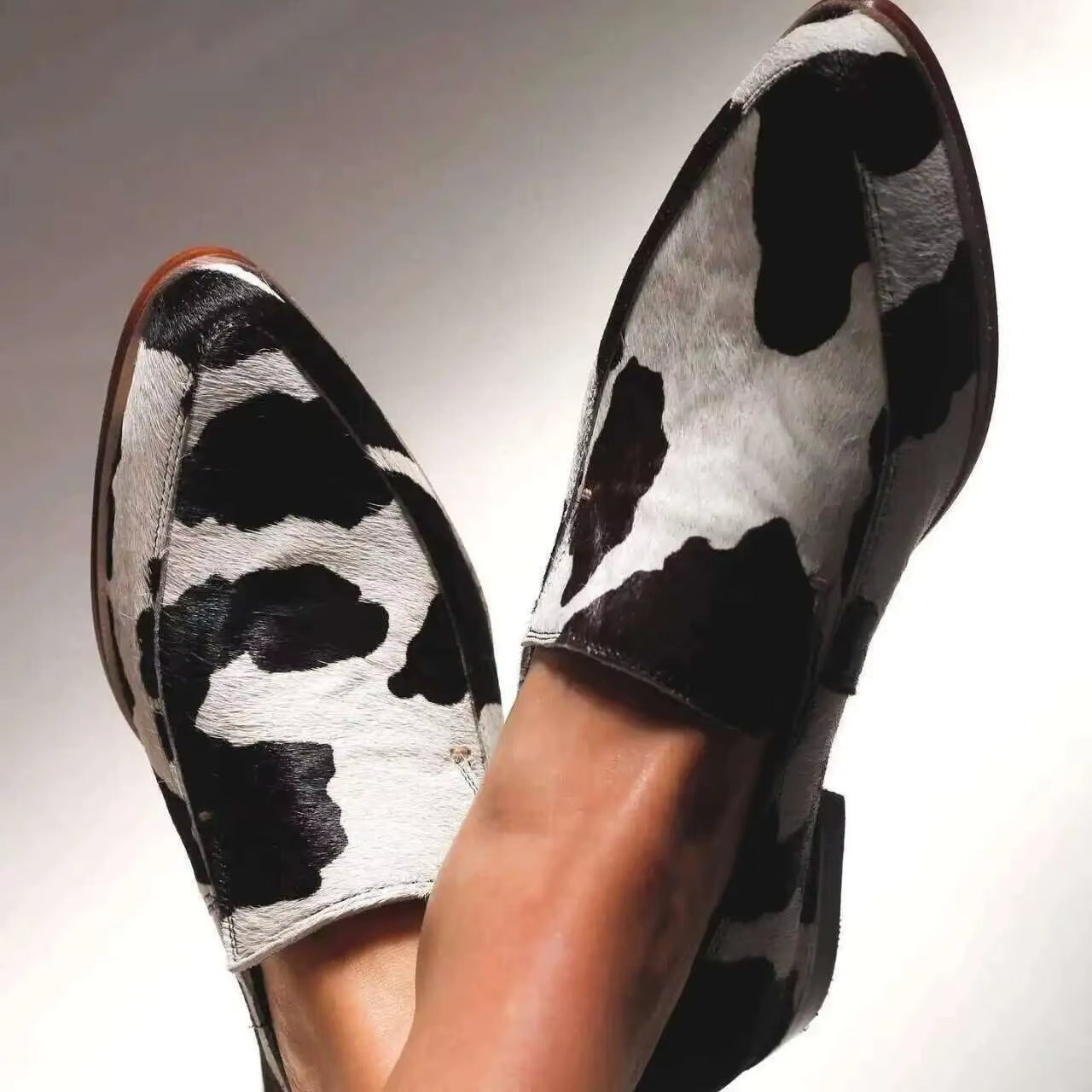 Paloma – Suede Loafers with Cow Print Design